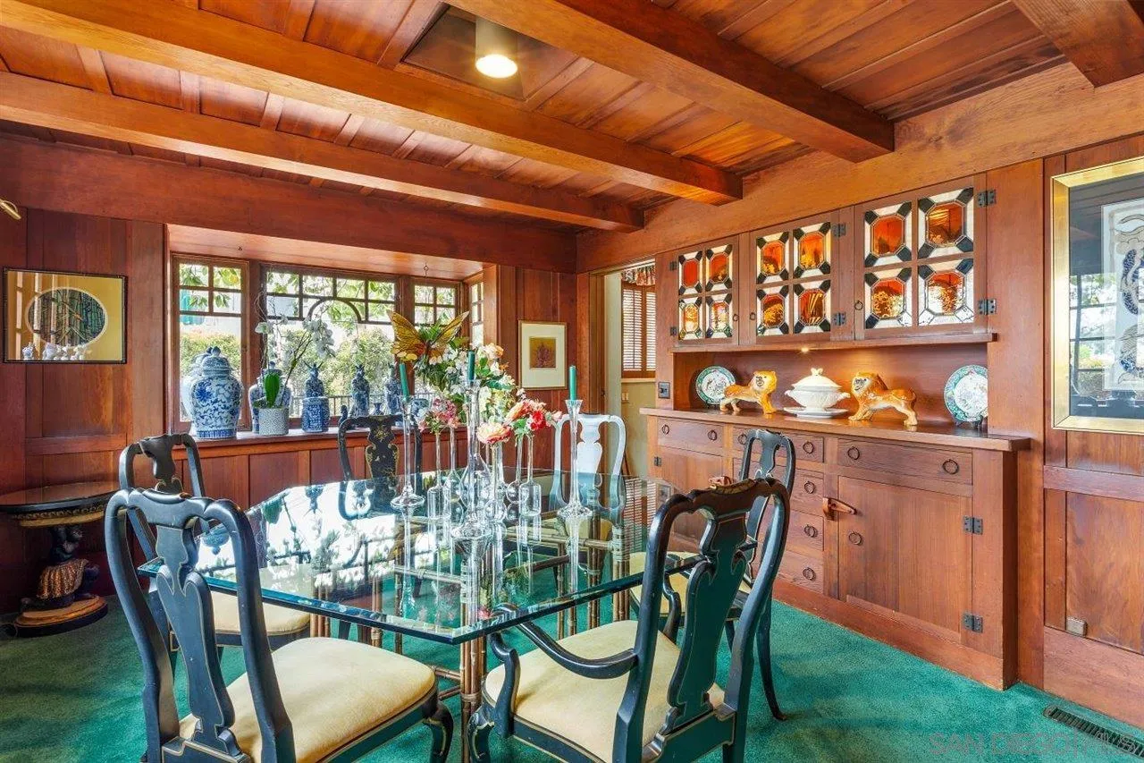 7944 Princess Street La Jolla, CA 92037 - Photo 15 of 39 a view of a dining room with furniture window and outside view