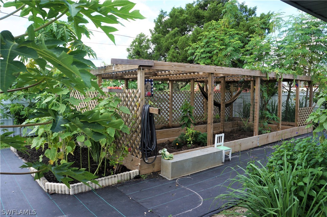 30337 Beech Road Punta Gorda, FL 33982 - Photo 8 of 33 a garden view with a seating space