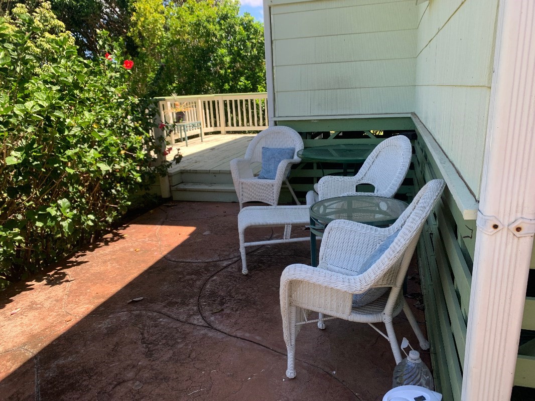 3521 Wailani Road Koloa, HI 96756 - Photo 15 of 17 a view of backyard with outdoor seating and plants