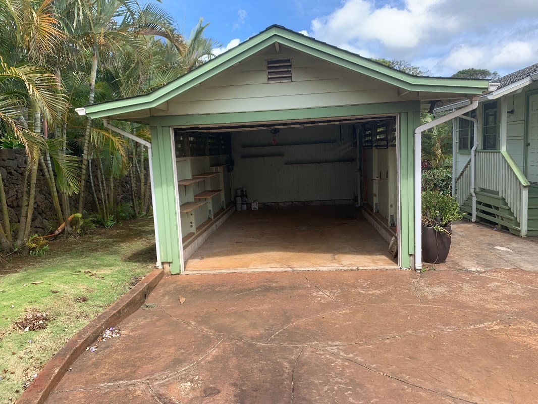 3521 Wailani Road Koloa, HI 96756 - Photo 2 of 17 a view of yellow house with a small yard