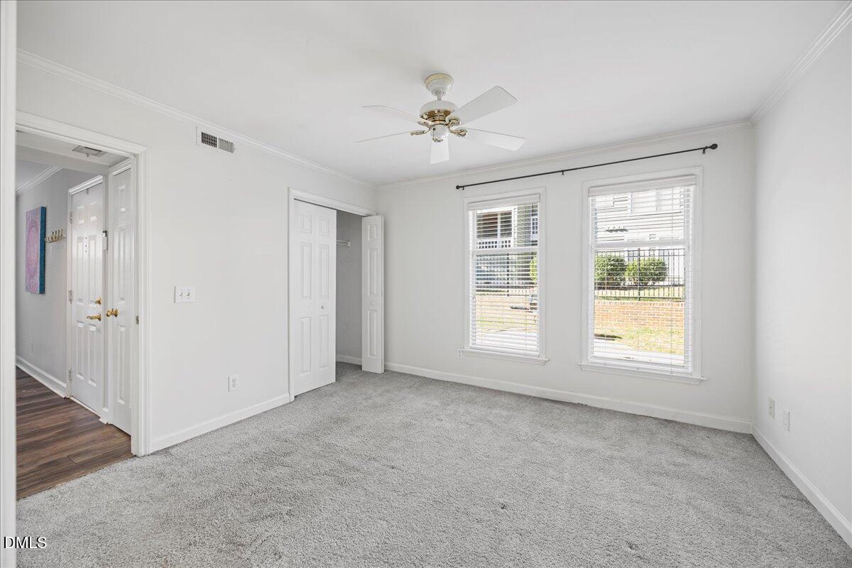 1101 Parkridge Lane, Unit 107 Raleigh, NC 27605 - Photo 14 of 33 a view of an empty room with a window