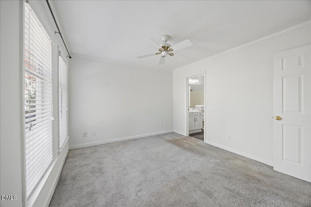 1101 Parkridge Lane, Unit 107 Raleigh, NC 27605 - Photo 15 of 33 a view of an empty room with a window
