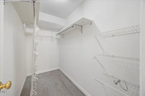 a view of a room with racks on the wall