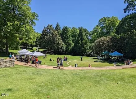 a view of a park with swings and slides