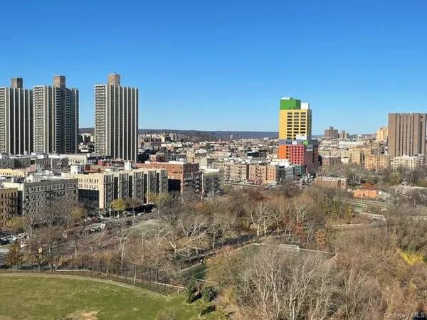 a view of a city with tall buildings