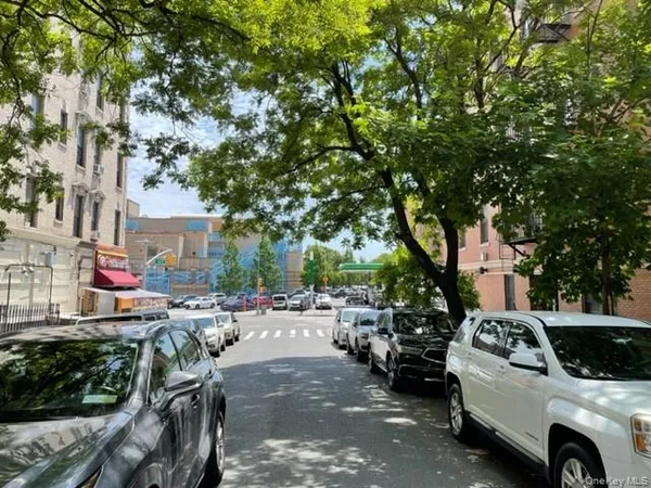 a view of outdoor space with deck and car parked
