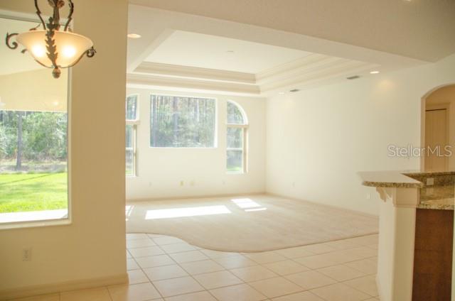 8 Eastland Lane Palm Coast, FL 32164 - Photo 17 of 60 a view of a bathroom with a tub and a shower
