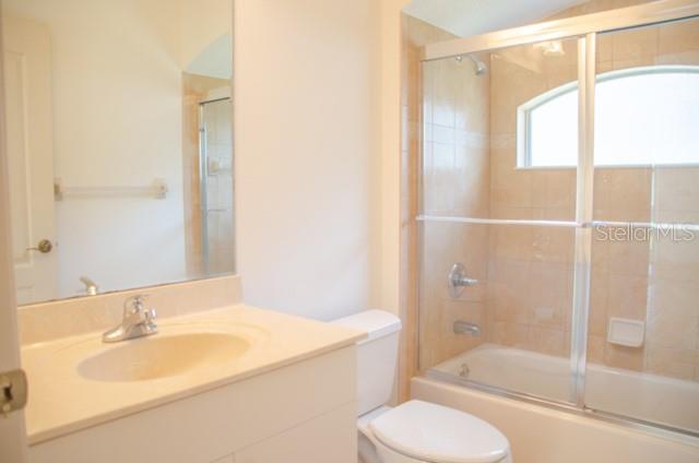 8 Eastland Lane Palm Coast, FL 32164 - Photo 30 of 60 a bathroom with a sink toilet and shower