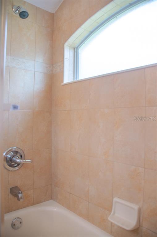 8 Eastland Lane Palm Coast, FL 32164 - Photo 34 of 60 a bathroom with a bathtub