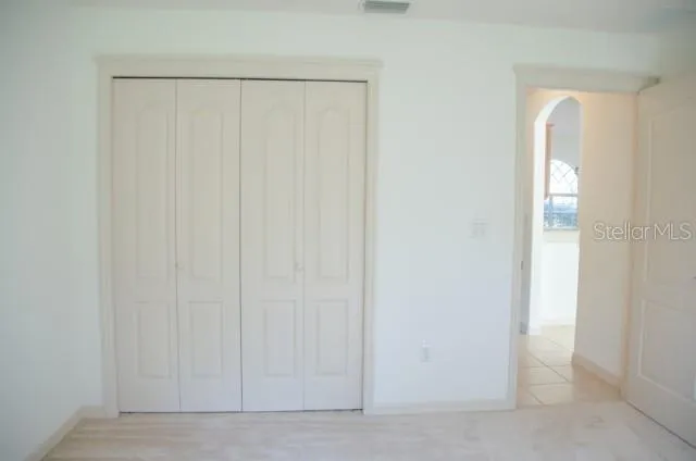 a bathroom with a bathtub and a window