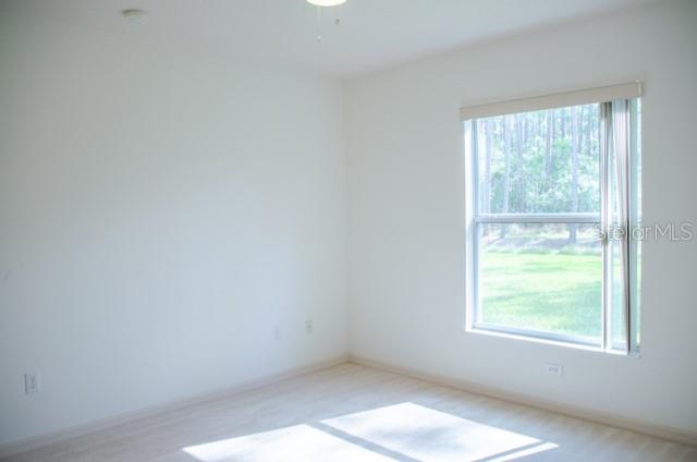 8 Eastland Lane Palm Coast, FL 32164 - Photo 38 of 60 an empty room with a window
