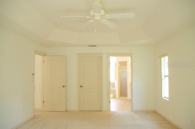 8 Eastland Lane Palm Coast, FL 32164 - Photo 39 of 60 an empty room with windows