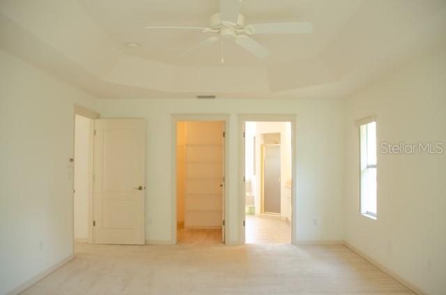 8 Eastland Lane Palm Coast, FL 32164 - Photo 40 of 60 an empty room with windows and closet