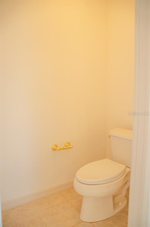 8 Eastland Lane Palm Coast, FL 32164 - Photo 45 of 60 a white toilet sitting next to a white walls