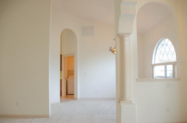 8 Eastland Lane Palm Coast, FL 32164 - Photo 8 of 60 a view of a livingroom with a window