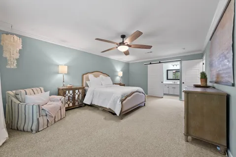 a bedroom with bed and window