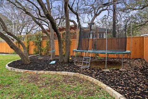 a table and chairs in the garden