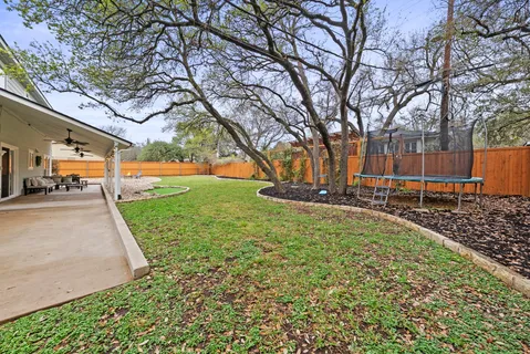 a view of a backyard with a garden