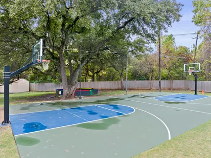 a view of a swimming pool with an outdoor seating