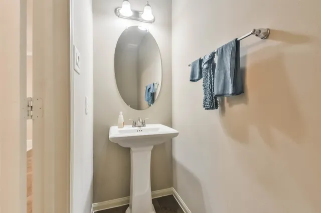 a view of walk in closet with clothes