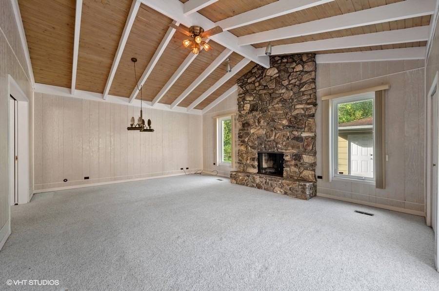 405 Locust Road Wilmette, IL 60091 - Photo 3 of 16 a view of empty room with a fireplace