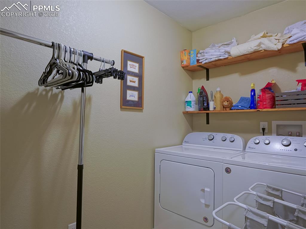 4792 Kerry Lynn View Colorado Springs, CO 80922 - Photo 14 of 34 a utility room with dryer and washer