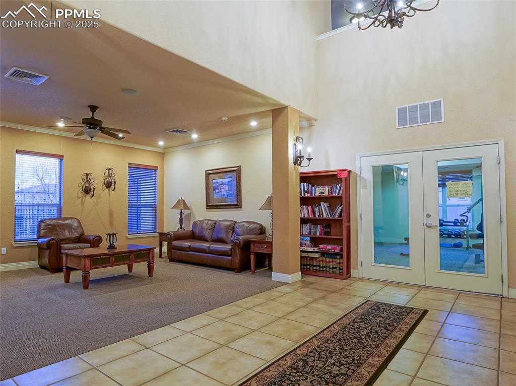 4792 Kerry Lynn View Colorado Springs, CO 80922 - Photo 24 of 31 a living room with furniture and wooden floor