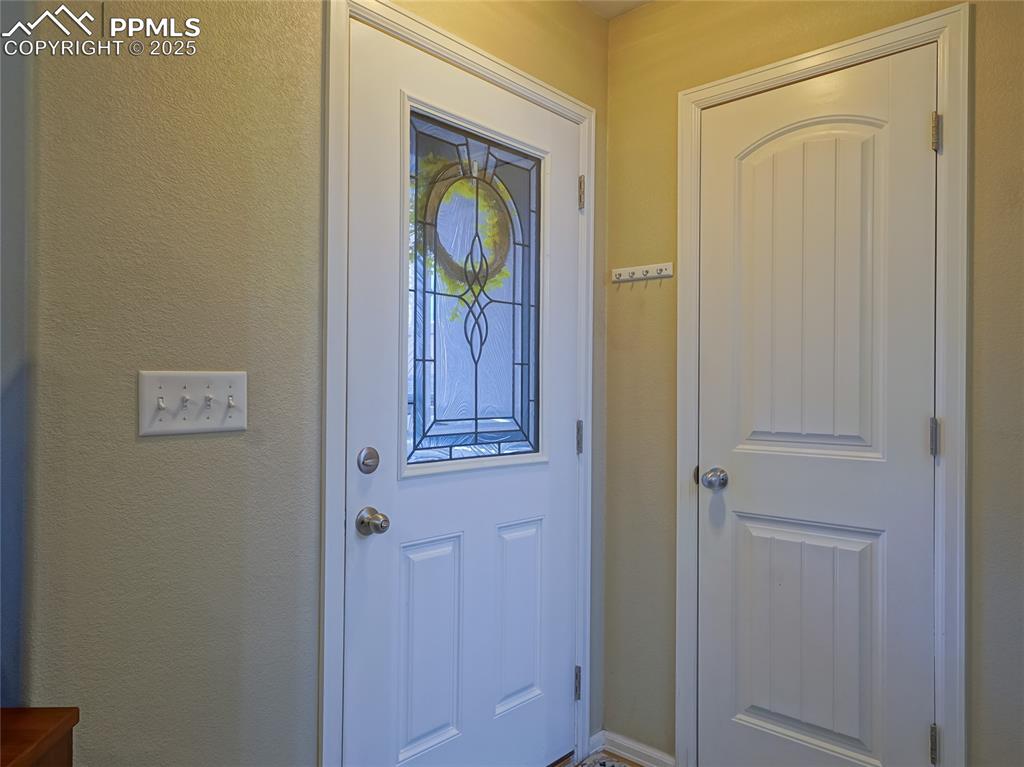 4792 Kerry Lynn View Colorado Springs, CO 80922 - Photo 3 of 31 a door with a door