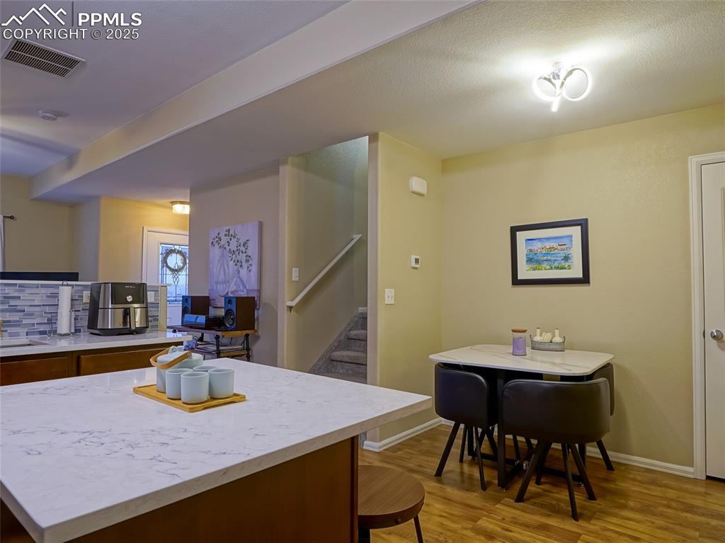 4792 Kerry Lynn View Colorado Springs, CO 80922 - Photo 9 of 31 a view of a dining room and livingroom