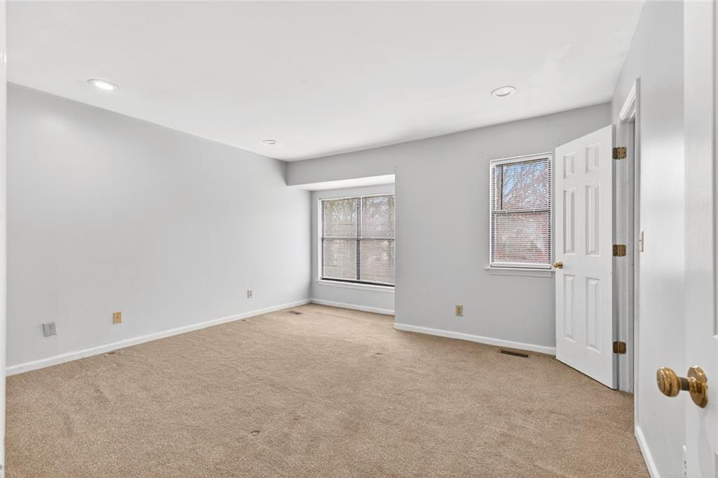 2226 Spring Walk Court Atlanta, GA 30341 - Photo 12 of 28 a view of an empty room with a window