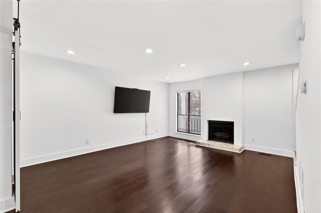 2226 Spring Walk Court Atlanta, GA 30341 - Photo 3 of 28 a view of empty room with wooden floor