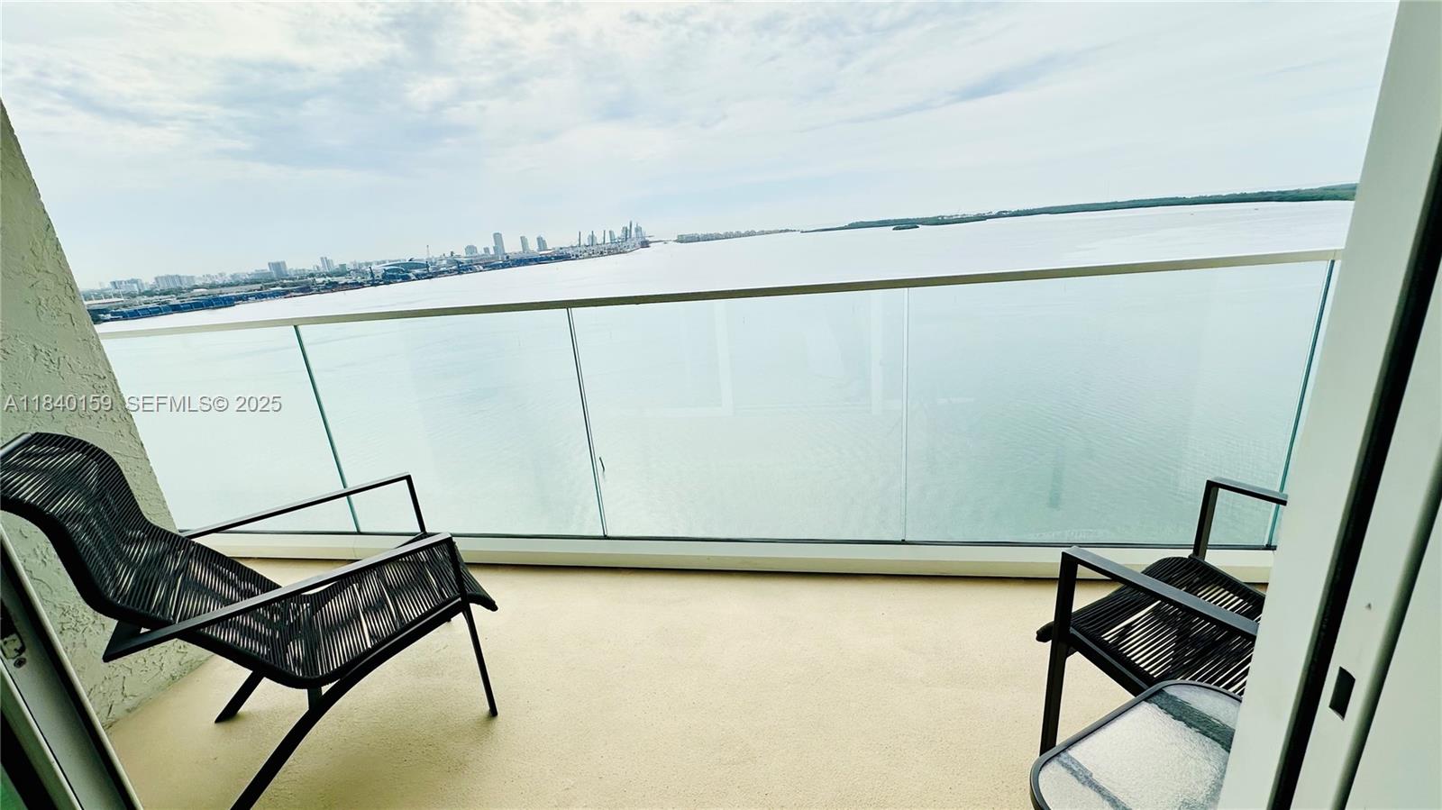 800 Claughton Island Drive, Unit 1903 Miami, FL 33131 - Photo 11 of 34 a view of a room with wooden floor