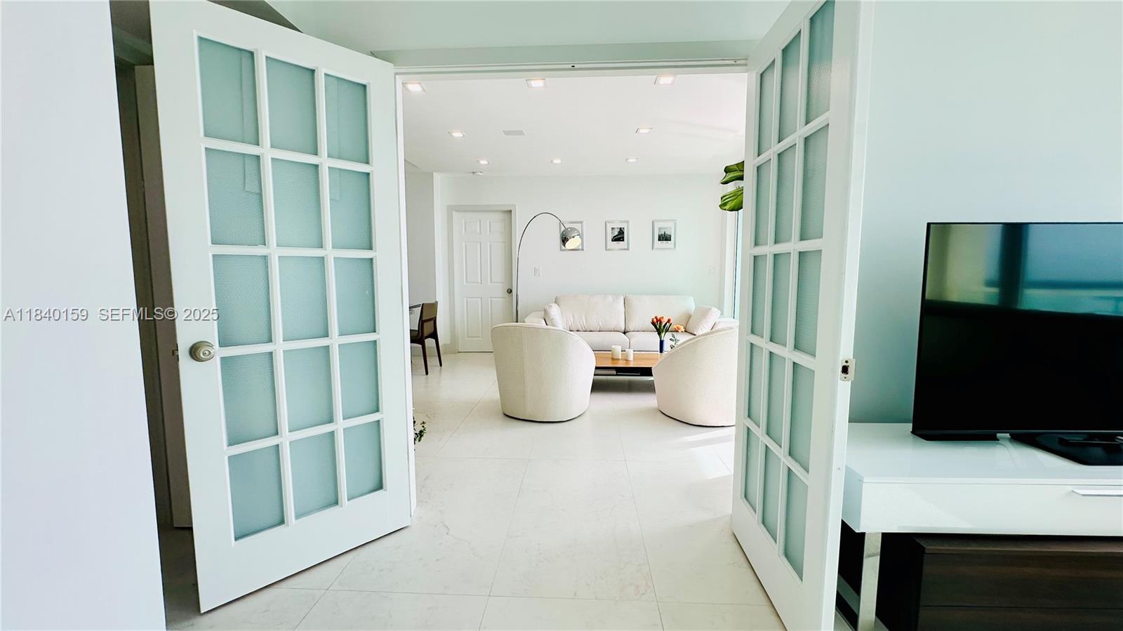 800 Claughton Island Drive, Unit 1903 Miami, FL 33131 - Photo 20 of 34 a view of a walk in closet