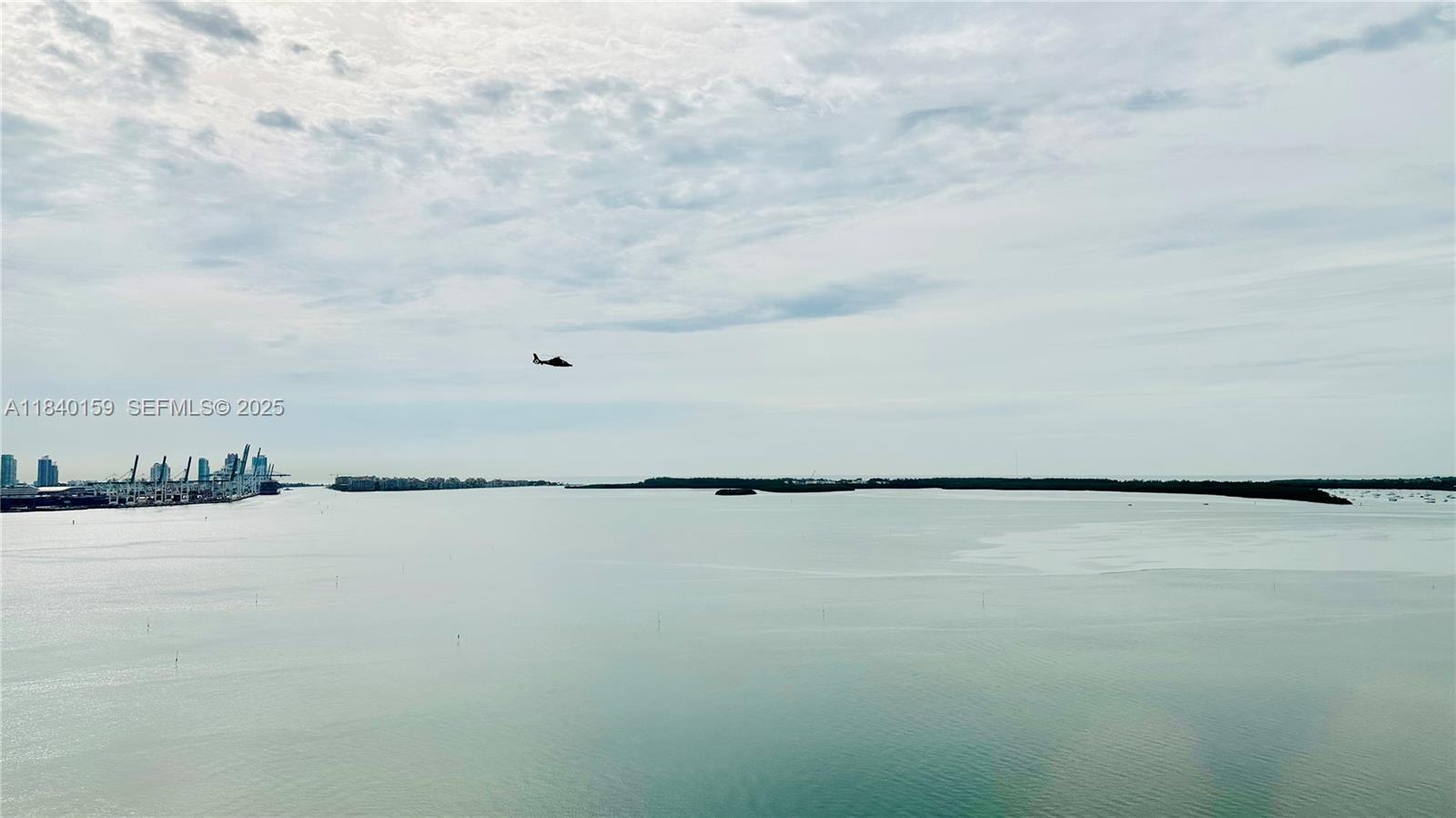 800 Claughton Island Drive, Unit 1903 Miami, FL 33131 - Photo 29 of 34 a view of a lake and mountain view