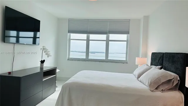 a view of city with tall buildings