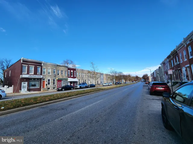 a view of a street with cars