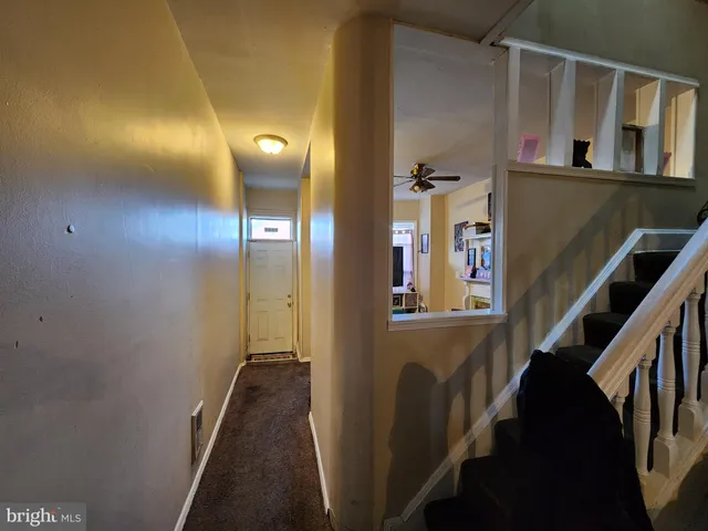 a view of hallway with stairs