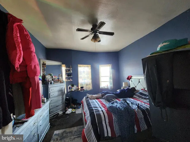 a bed room with a bed and a walk in closet