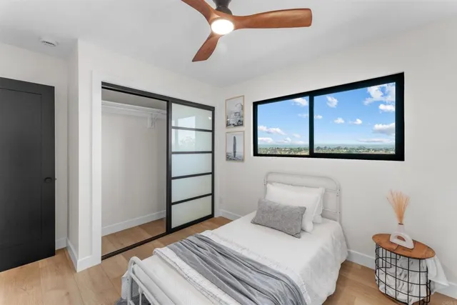 a view of a house with wooden deck