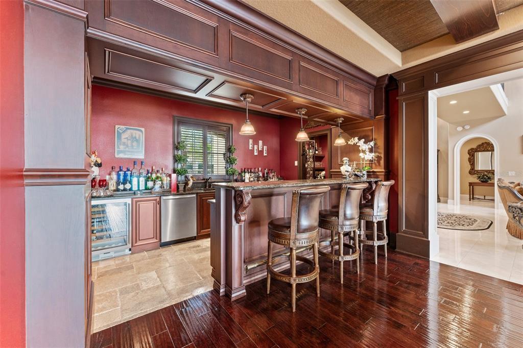 5070 Down Point Lane Windermere, FL 34786 - Photo 17 of 57 a view of a dining area with furniture and wooden floor
