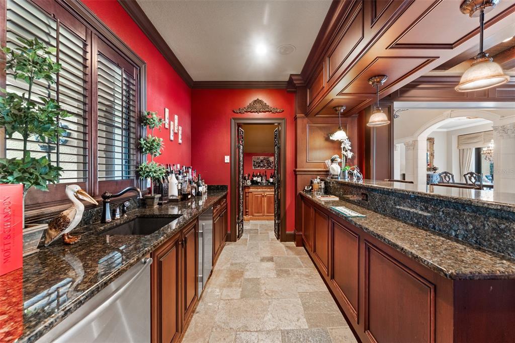 5070 Down Point Lane Windermere, FL 34786 - Photo 18 of 57 a long hallway with furniture and a large window