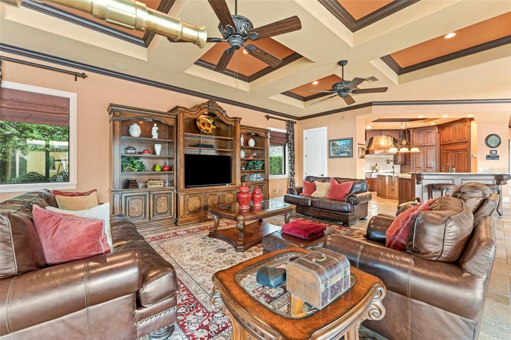 5070 Down Point Lane Windermere, FL 34786 - Photo 22 of 57 a living room with furniture and a flat screen tv