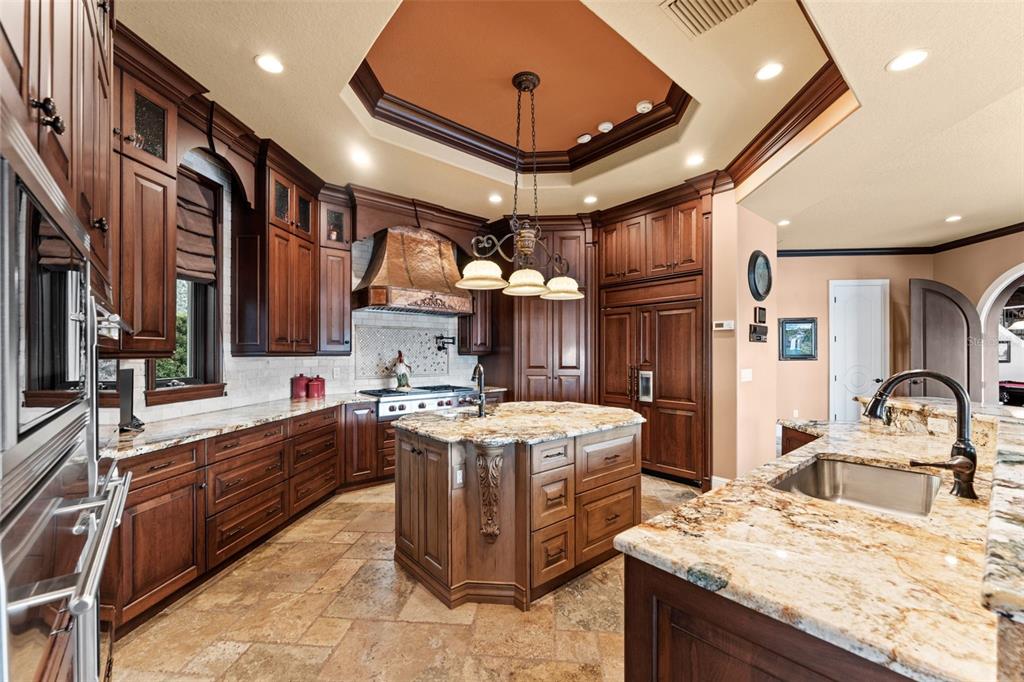 5070 Down Point Lane Windermere, FL 34786 - Photo 24 of 57 a kitchen that has a sink and a stove in it