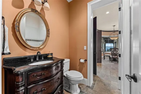 a spacious bathroom with a double vanity sink mirror and bathtub