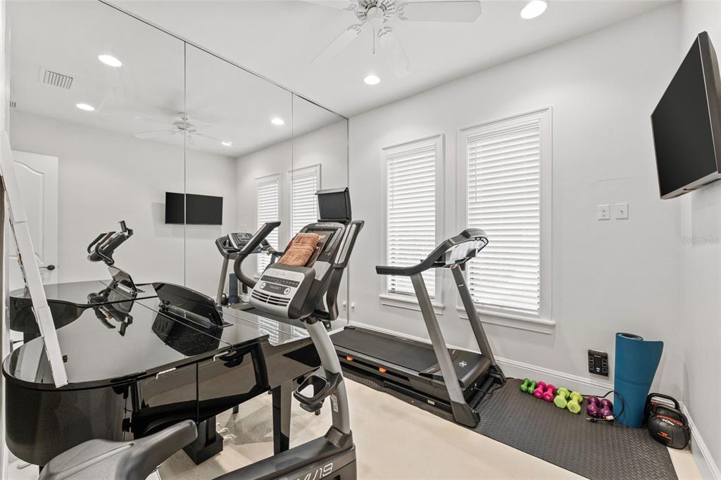 5070 Down Point Lane Windermere, FL 34786 - Photo 33 of 57 a view of a room with gym equipment