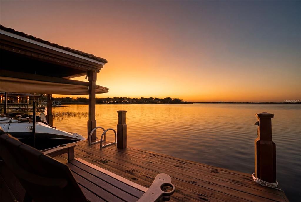 5070 Down Point Lane Windermere, FL 34786 - Photo 4 of 57 a view of outdoor space with wooden floor and outdoor seating