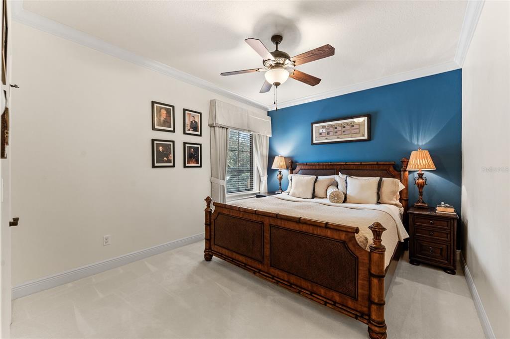 5070 Down Point Lane Windermere, FL 34786 - Photo 46 of 57 a bedroom with a bed and painting on the wall