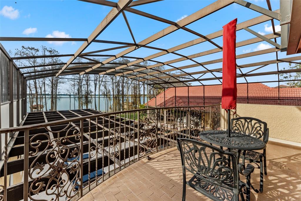 5070 Down Point Lane Windermere, FL 34786 - Photo 48 of 57 a view of a chairs and table in wooden roof