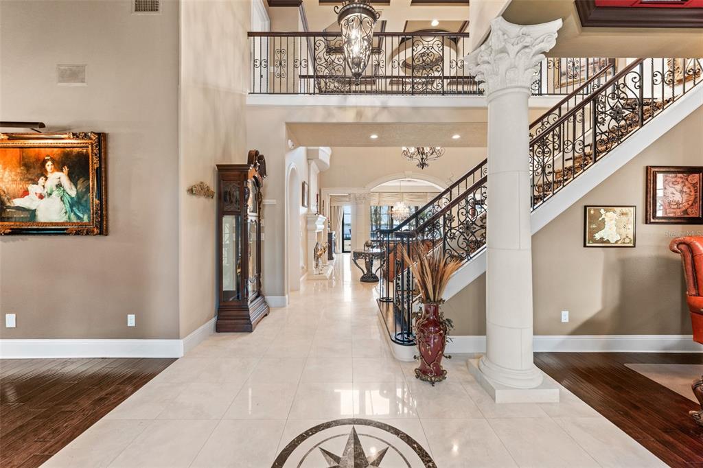 5070 Down Point Lane Windermere, FL 34786 - Photo 6 of 57 a view of entryway and hall with wooden floor
