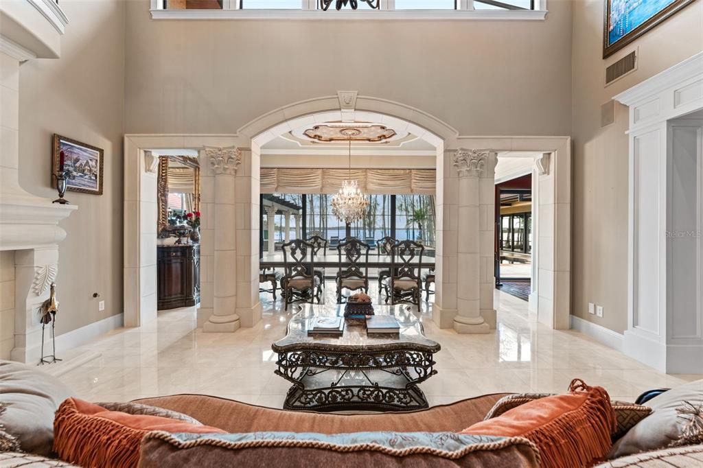 5070 Down Point Lane Windermere, FL 34786 - Photo 10 of 57 a living room with furniture and a large window